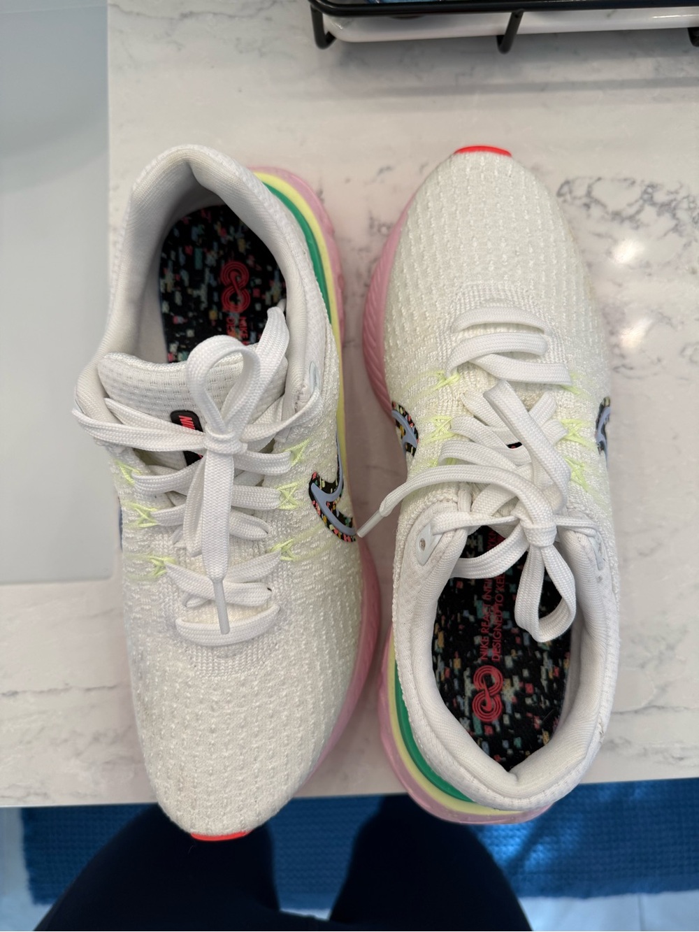 Nike White Knit Running Shoes with Pastel Rainbow Accents